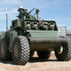 Image for article titled DARPA's Crusher Drives Itself, Laughs at Your Puny "Traffic"
